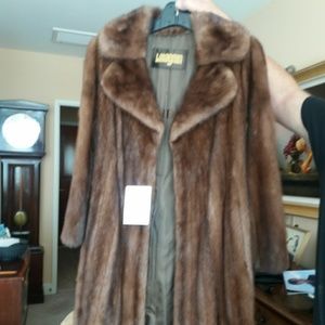 Classic full length Mink coat. Stored at S F O.
